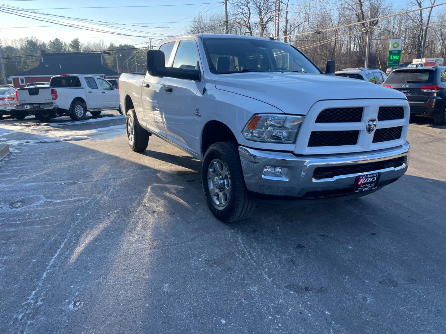 2016 White /Black RAM 2500 Outdoorsman Crew Cab SWB 4WD (3C6UR5DL4GG) with an 6.7L I6 OHV 24V TURBO DIESEL engine, 6A transmission, located at 11115 Chardon Rd. , Chardon, OH, 44024, (440) 214-9705, 41.580246, -81.241943 - Photo#2